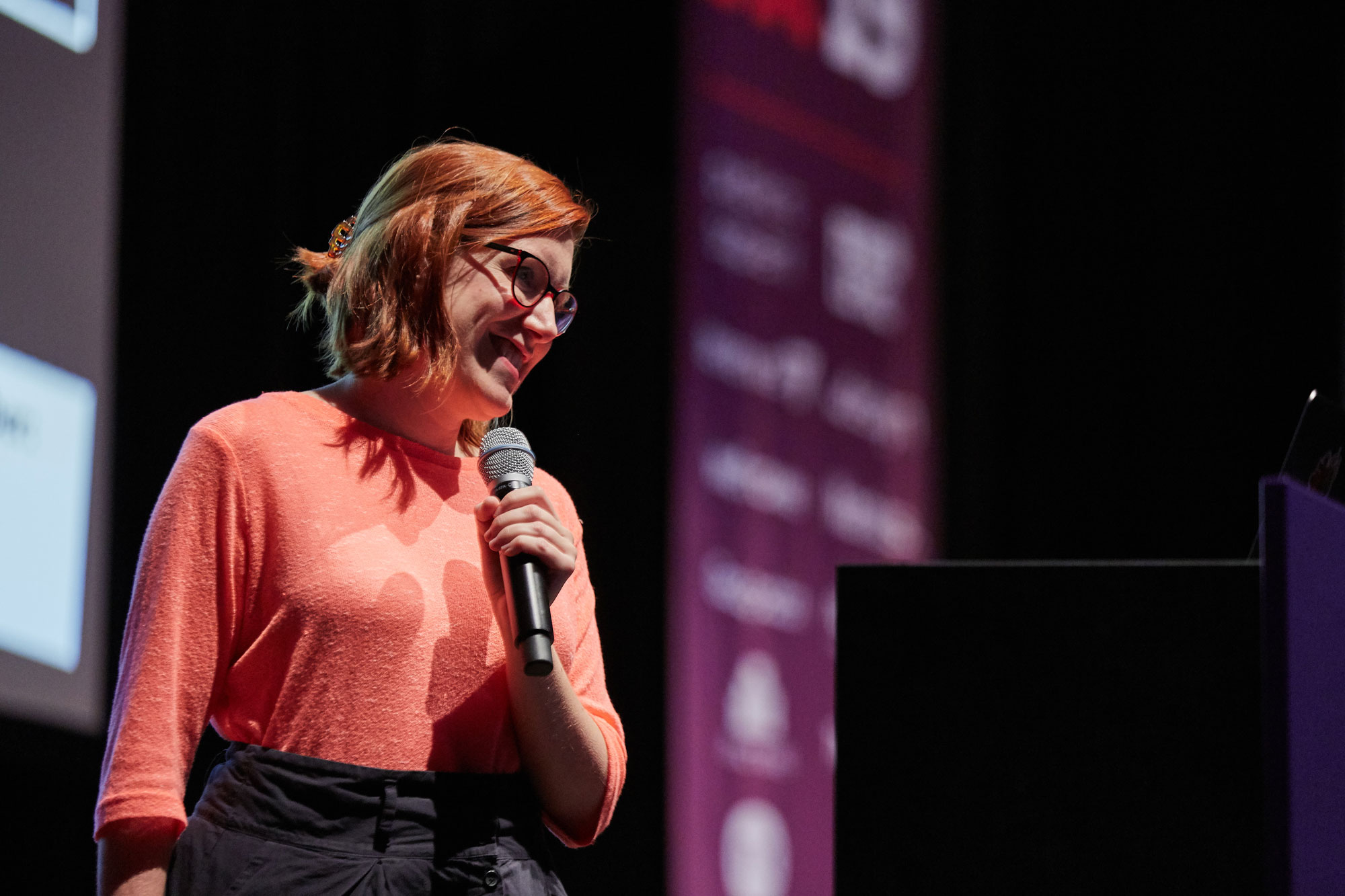 Laura Vidal on stage at the Push UX Conference during the talk